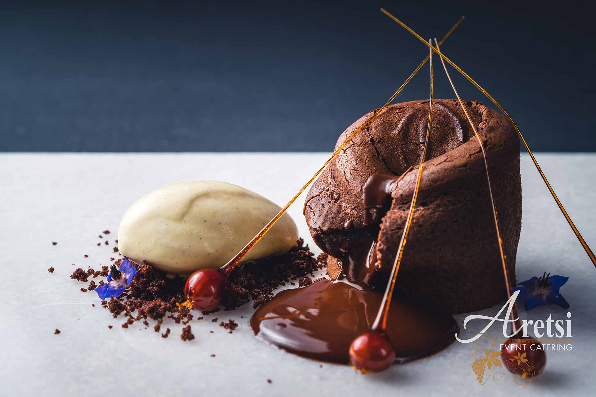 Chocolate fondant with vanilla ice cream and spun sugar by Aretsi