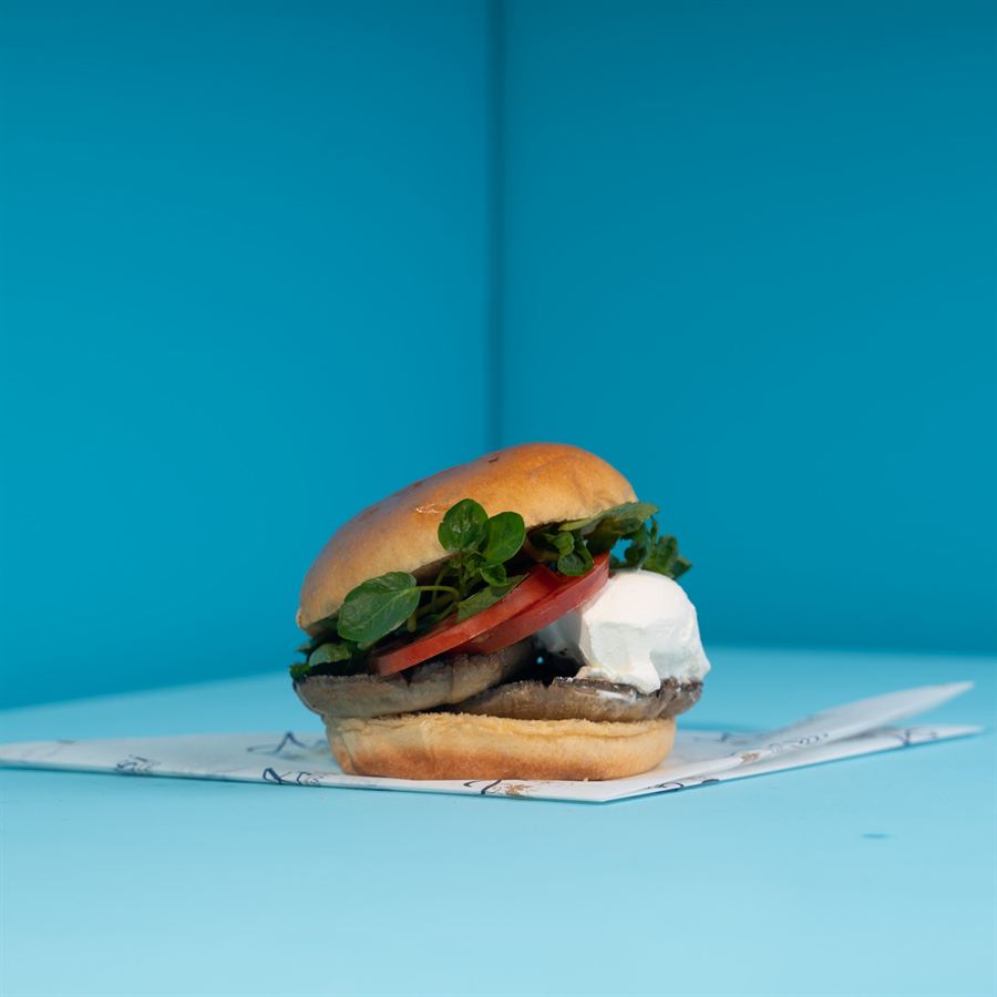 A breakfast bap with egg and spinach