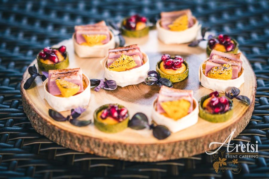 Canapés on a rustic wooden board