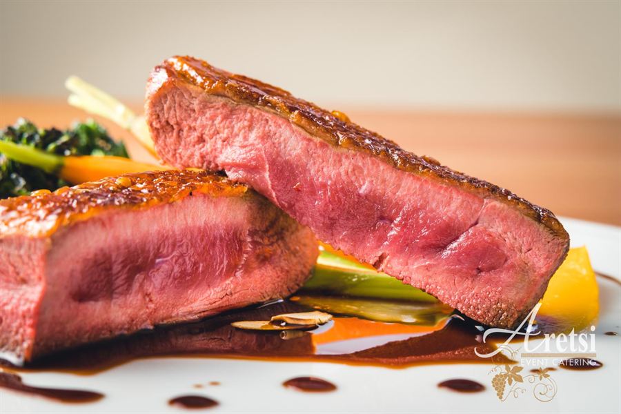 Seared duck breast plated by Chef Ioannis
