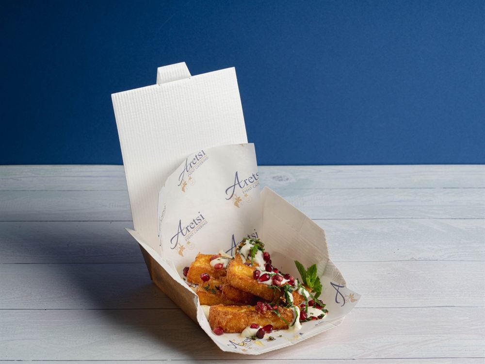 Crispy halloumi with pomegranate, mint and yoghurt in an Aretsi box