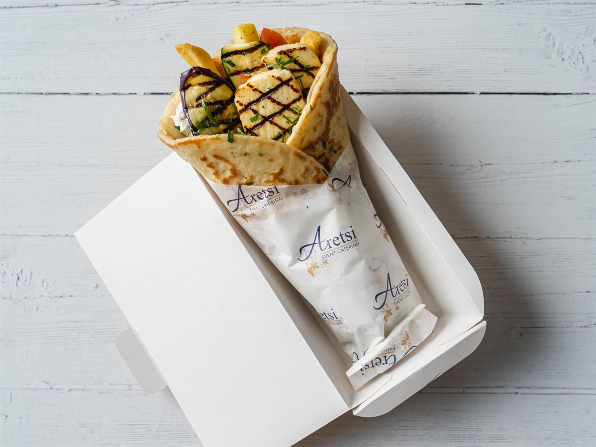 An Aretsi grilled halloumi pitta with chargrilled aubergine and courgette