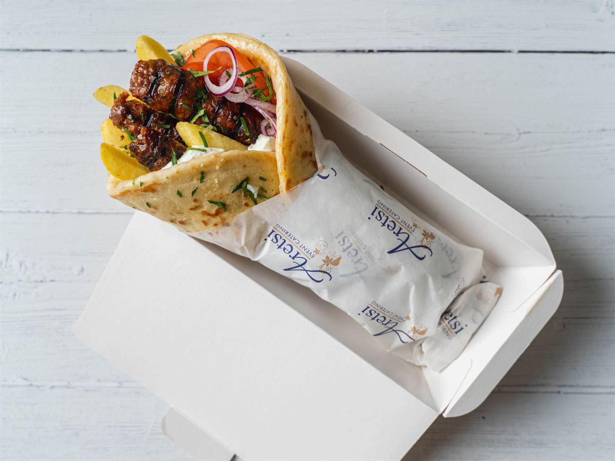 An Aretsi pork souvlaki pitta with fries and tzatziki